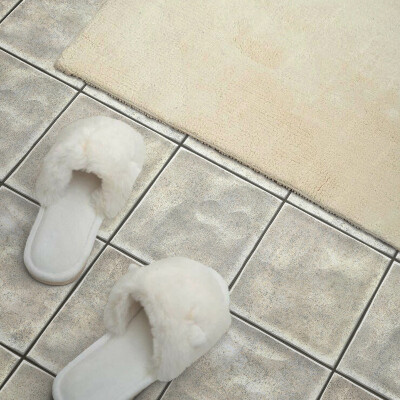 Zelfklevende vinyltegels Een motief dat keramische tegels imiteert