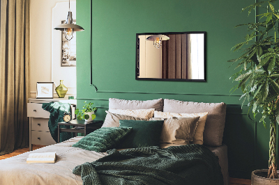 Decoratieve rechthoekige spiegel in een zwarte lijst