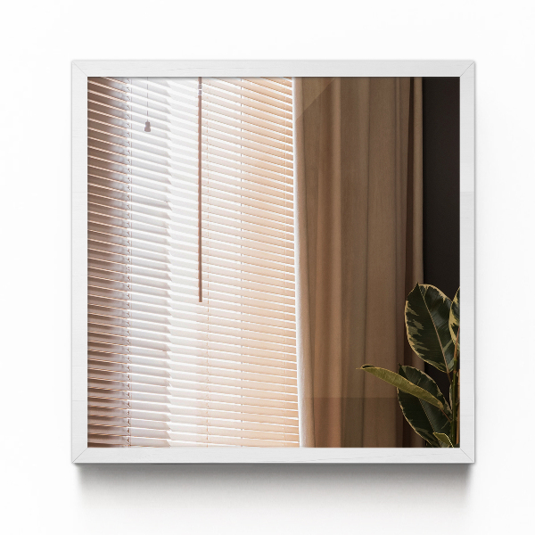 Decoratieve rechthoekige spiegel in een witte lijst