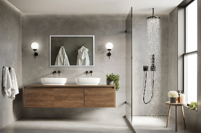 Decoratieve rechthoekige spiegel in een witte lijst