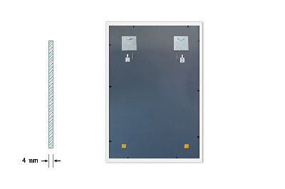 Decoratieve rechthoekige spiegel in een witte lijst