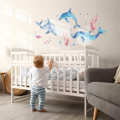Muur stickers 100x155 Blauwe dolfijnen in een pastelkleurig onderwaterlandschap