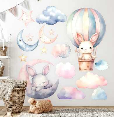 Muurstickers 130x173 Konijnen in een pastelkleurige lucht met een ballon 's nachts