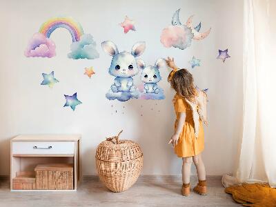 Muurstickers 60x80 Konijntjes in een pastelkleurige lucht met een regenboog en sterren