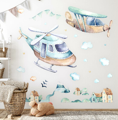 Muurstickers 60x87 Een helikopter en een vliegtuig in een pastelkleurig stadje
