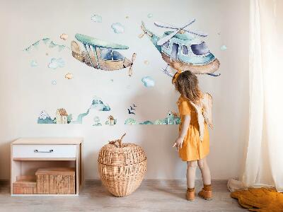 Muurstickers 60x87 Een helikopter en een vliegtuig in een pastelkleurig stadje