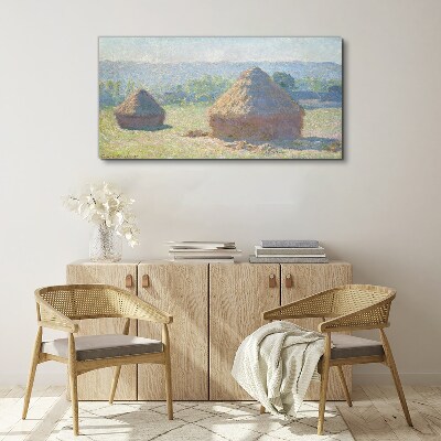 Schilderij op doek Zomerzon boven hooibergen