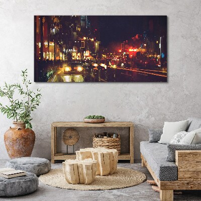 Canvas schilderij Nachtstraat in het schijnsel van de lichten