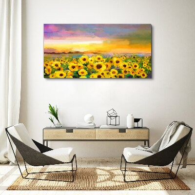 Schilderij op doek Zonnebloemen in de zonnestralen van de zonsondergang