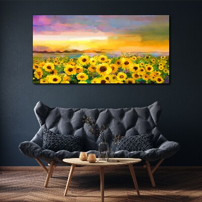 Schilderij op doek Zonnebloemen in de zonnestralen van de zonsondergang