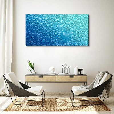 Foto op canvas Waterdruppels op een blauwe achtergrond