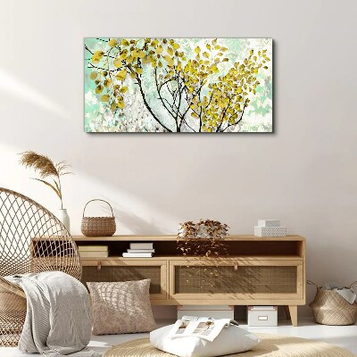 Foto op canvas Lentebladeren tegen een blauwe achtergrond