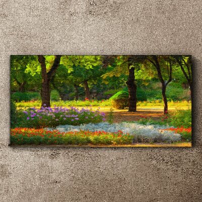 Schilderij op doek Een bloemenparadijs in een zonnige tuin