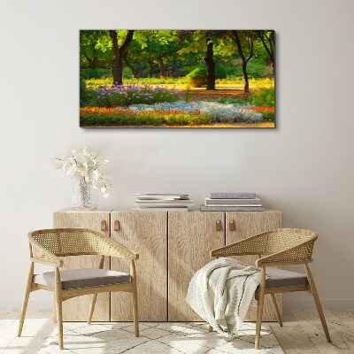 Schilderij op doek Een bloemenparadijs in een zonnige tuin