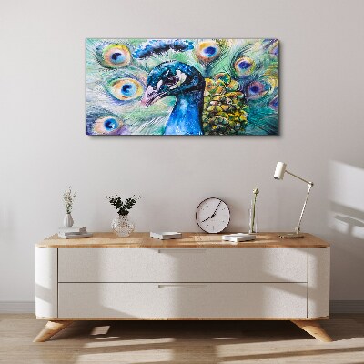 Schilderij op doek Een kleurrijke pauw tussen veren