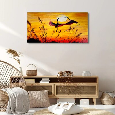 Foto op canvas Dansende kraanvogels bij zonsondergang