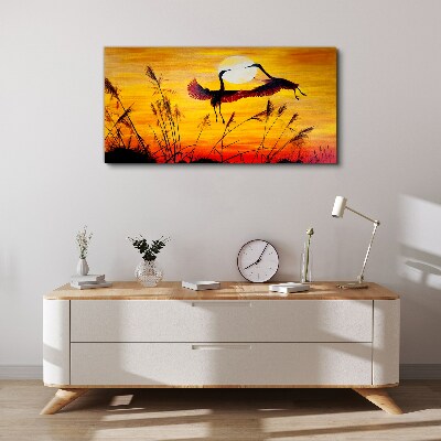 Foto op canvas Dansende kraanvogels bij zonsondergang