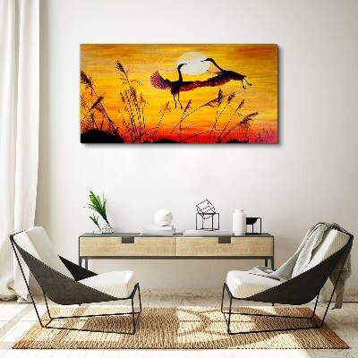 Foto op canvas Dansende kraanvogels bij zonsondergang