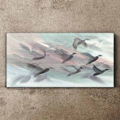 Foto op canvas Vlucht van vogels in een pastelkleurige aura