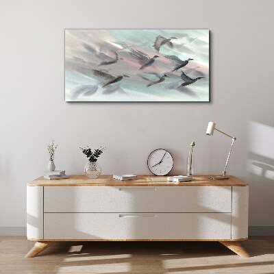 Foto op canvas Vlucht van vogels in een pastelkleurige aura