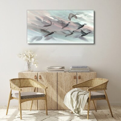 Foto op canvas Vlucht van vogels in een pastelkleurige aura