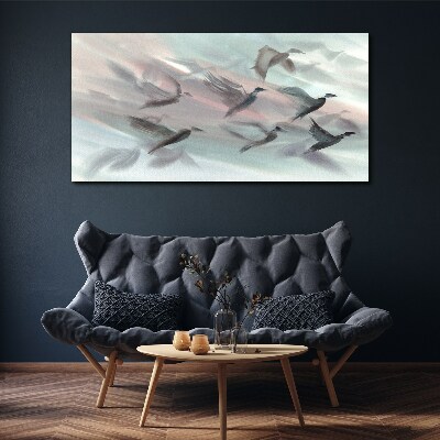 Foto op canvas Vlucht van vogels in een pastelkleurige aura