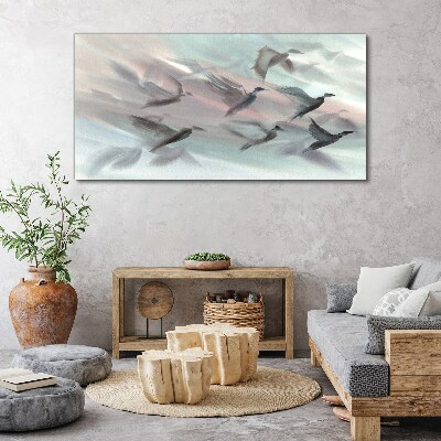 Foto op canvas Vlucht van vogels in een pastelkleurige aura