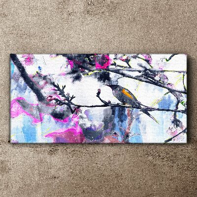 Schilderij op doek Een kleurrijke vogel tegen een achtergrond van bloemen