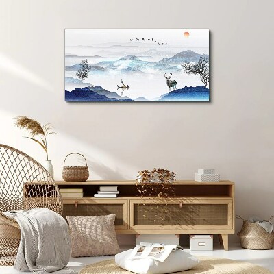 Schilderij op doek Een vredig berglandschap met een hert