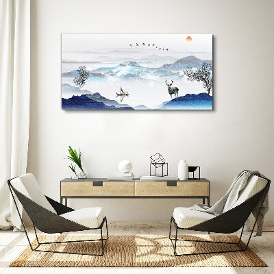 Schilderij op doek Een vredig berglandschap met een hert