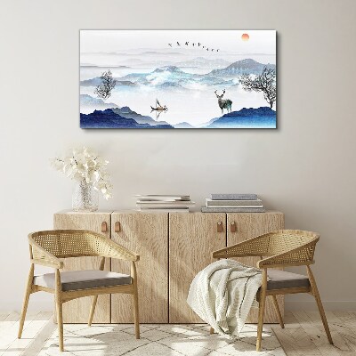 Schilderij op doek Een vredig berglandschap met een hert