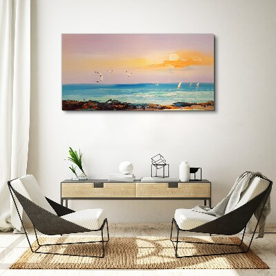 Schilderij op doek Een vredige zonsondergang boven de zee
