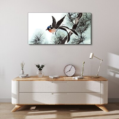 Foto op canvas Een vogel in vlucht over de dennen