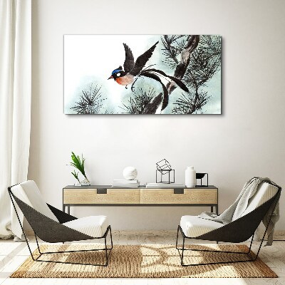 Foto op canvas Een vogel in vlucht over de dennen