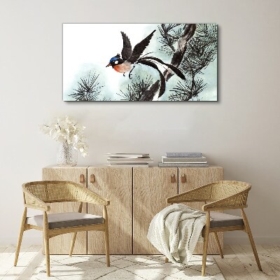 Foto op canvas Een vogel in vlucht over de dennen