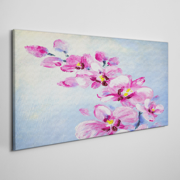 Foto op canvas Roze orchideeën op een blauwe achtergrond