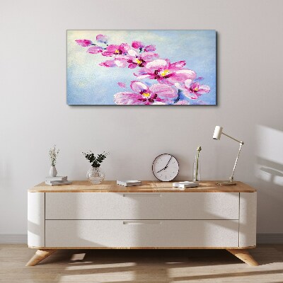Foto op canvas Roze orchideeën op een blauwe achtergrond