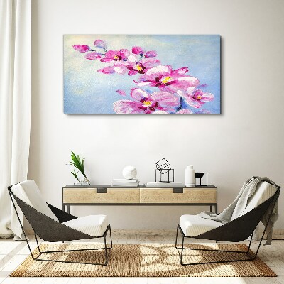 Foto op canvas Roze orchideeën op een blauwe achtergrond
