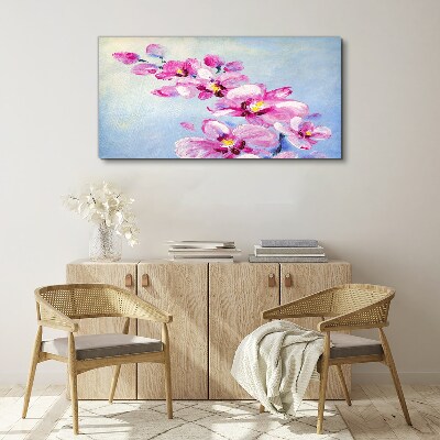 Foto op canvas Roze orchideeën op een blauwe achtergrond