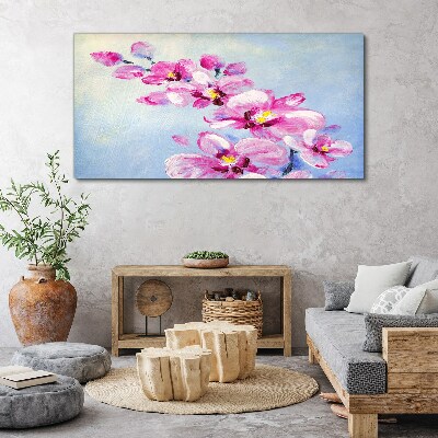 Foto op canvas Roze orchideeën op een blauwe achtergrond