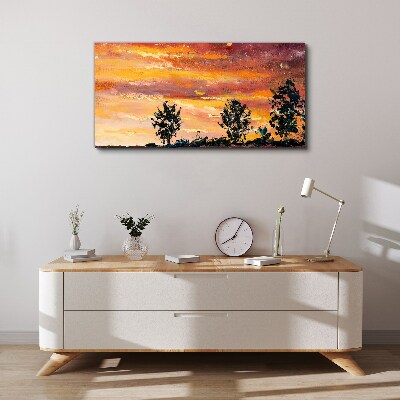 Foto op canvas Zonsondergang boven de bomen