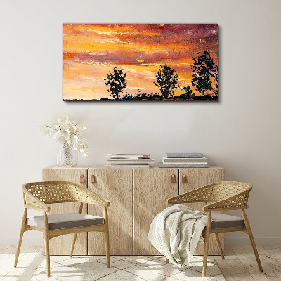 Foto op canvas Zonsondergang boven de bomen
