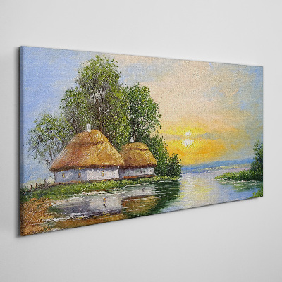 Canvas schilderij Een vredige zonsondergang boven het dorp