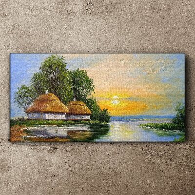 Canvas schilderij Een vredige zonsondergang boven het dorp