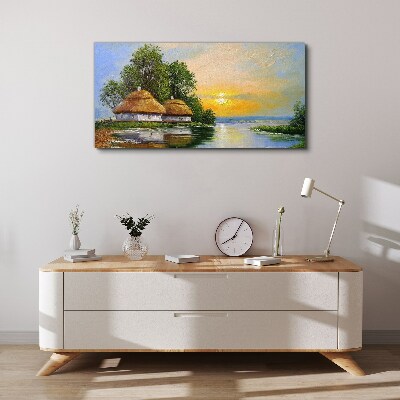 Canvas schilderij Een vredige zonsondergang boven het dorp