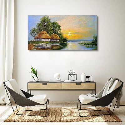 Canvas schilderij Een vredige zonsondergang boven het dorp