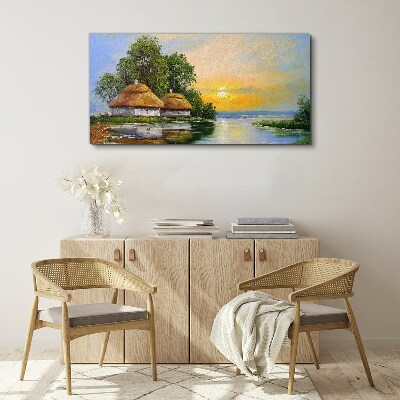 Canvas schilderij Een vredige zonsondergang boven het dorp