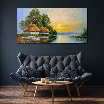 Canvas schilderij Een vredige zonsondergang boven het dorp