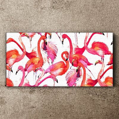Schilderij op doek Roze flamingo's in een tropische dans