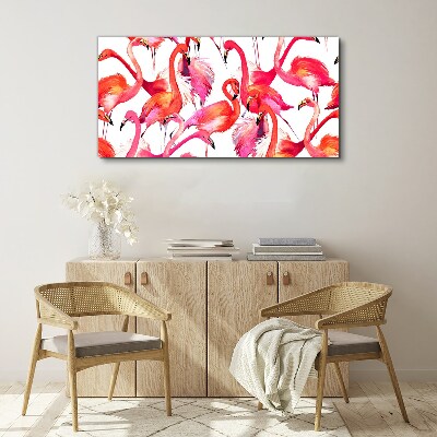 Schilderij op doek Roze flamingo's in een tropische dans